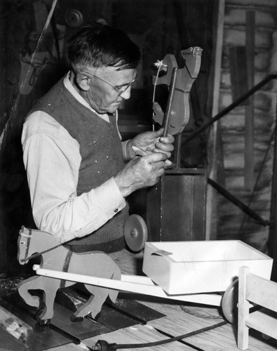 J. E. Butler in his 'Santa' workshop