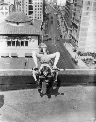 Rooftop female acrobat