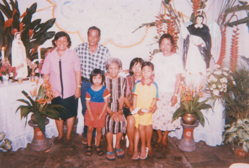 Family at feast of San Vicente Ferrer in Philippines