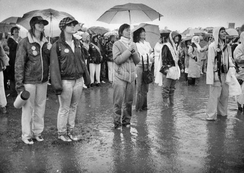 Rain doesn't dampen women's rights march