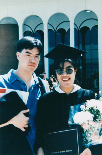 Graduate with her brother