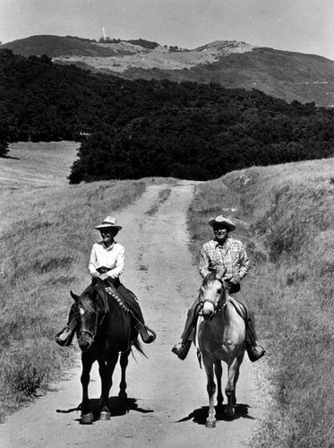 Ronald and Nancy Reagan riding