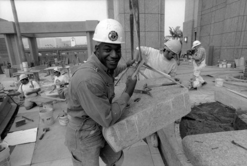 Construction workers at the MTA building