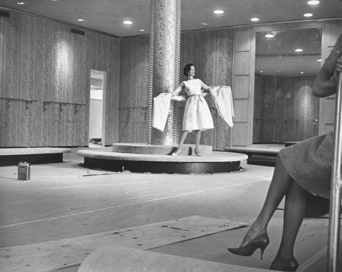 Model in Castillian room of Bullock's Fashion Square in Sherman Oaks