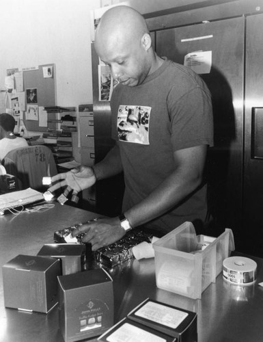 Labeling chocolates, John Kelly Chocolates