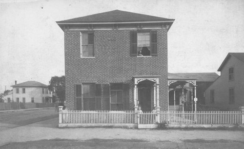 Brick house at 5th Street and Broadway