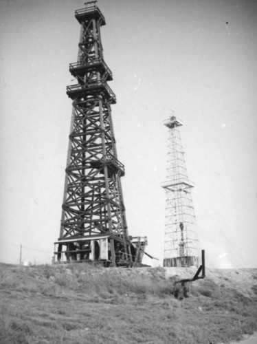 Two derricks in the Montebello oil field