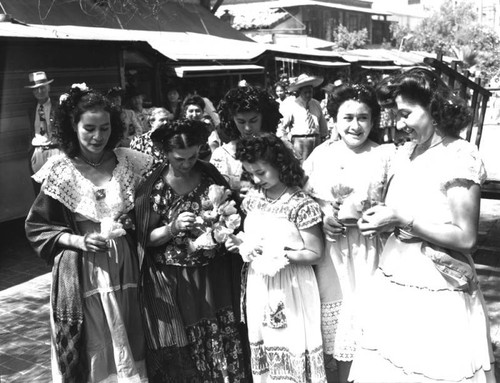 Women with flowers on Olvera Street