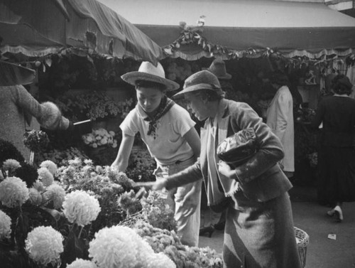 Choosing flowers at the Farmers Market Fall Festival