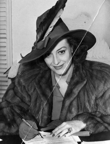 Joan Crawford to divorce Tone