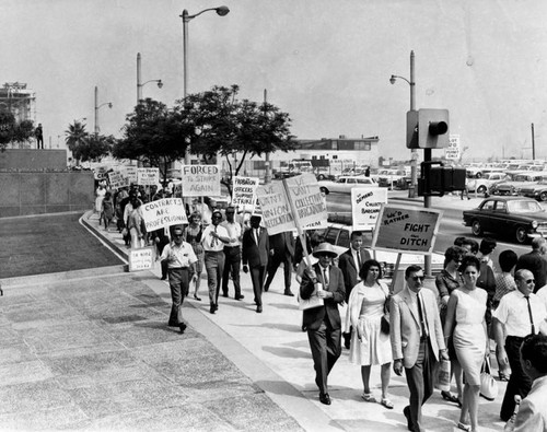 County employees take a walk in wage dispute