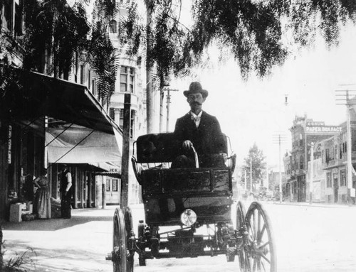 Man in car on Spring Street