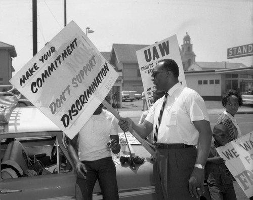 Demonstrators outside the Thriftimart