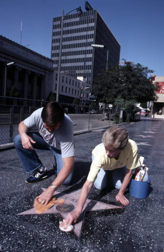 Cleaning a Walk of Fame star