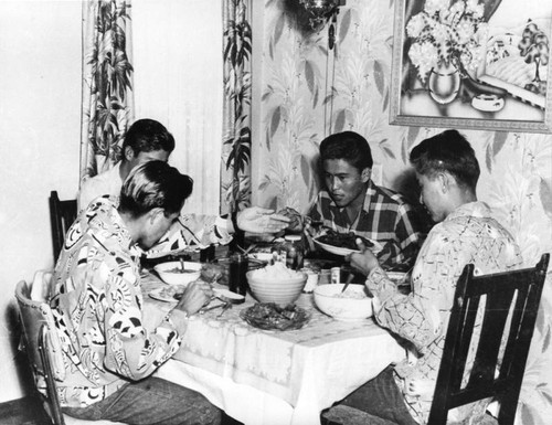 Boys at dinner table