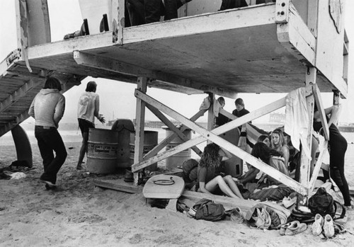 Hiding from rain at the beach