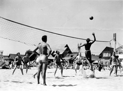 Men playing volleyball on Venice Beach