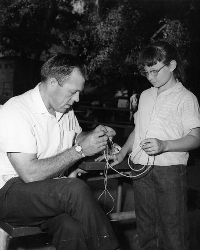 Learns laniard tying