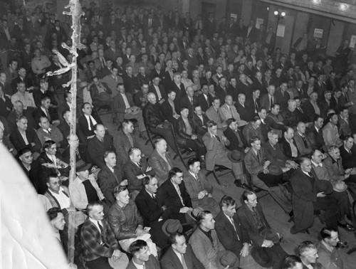 Workers at strike meeting