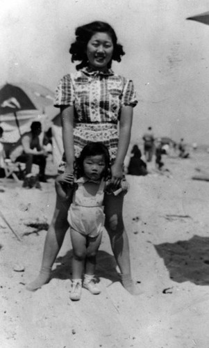 Woman and child at the beach