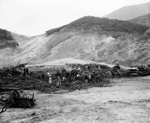 Cleaning up the dam's debris