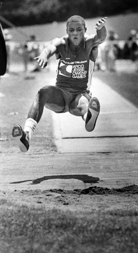 Carl Lewis doing the long jump