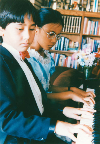 Siblings piano duet