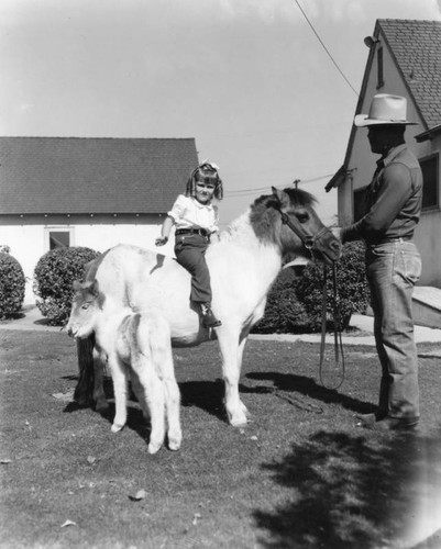 Riding bareback on a pony