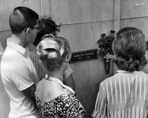 Now and then, tourists come to stare at Marilyn's crypt