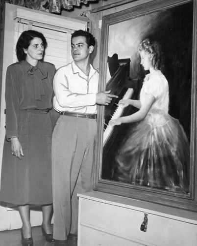 Edward Runci presents his portrait painting of 'Carla