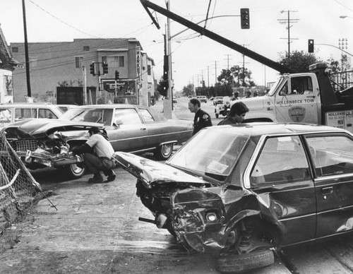 Pole falls in collision