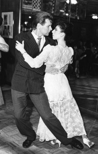 Walker and Bellucci dance the Tango