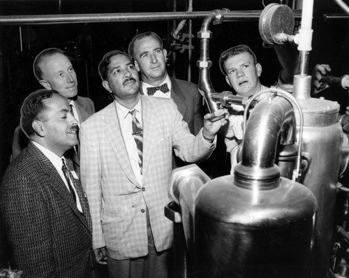 Visitors examine college creamery