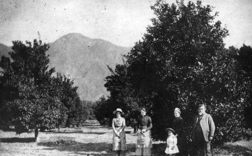 Allen family in orchard