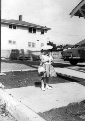 Girl in front of San Pedro home