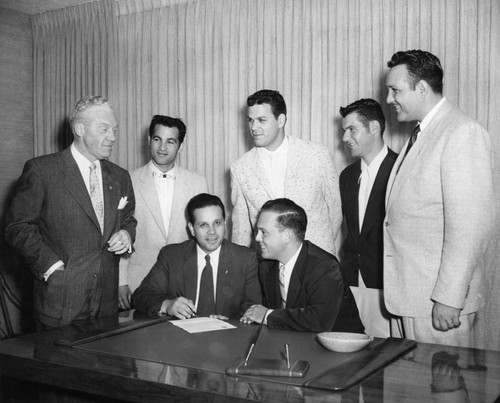 Modugno Bros. ink new contract — Calisphere