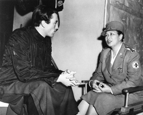 Dr. Margaret J. Chung with Gregory Peck on film location