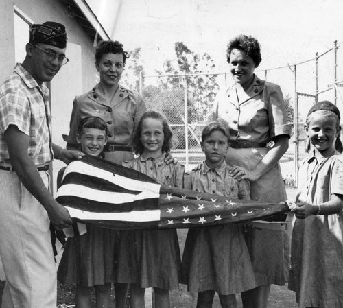 Brownies receive flag