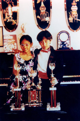 Young pianists with trophies