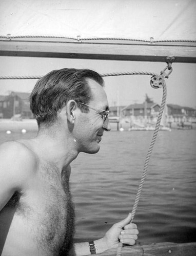 Manning the sails on a trip around Newport Beach