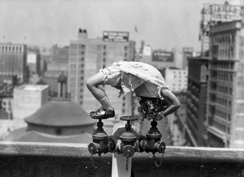 Rooftop child acrobat