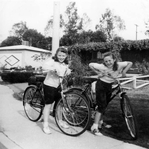 Linda and Mary Buckley on their bicycles