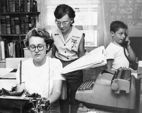 Lucille Ganz transcribes taped dictation with earphone