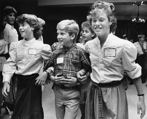 Children at a cotillion dance