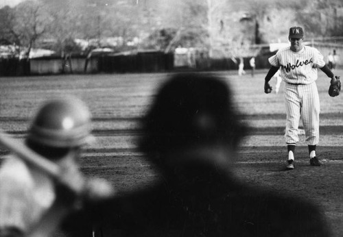 Jerry Anding, Van Nuys High pitcher, faces Cleveland batter, umpire and camera