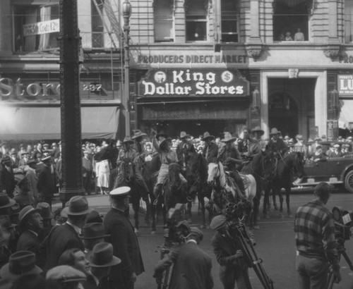 Parade participants greet crowds, view 5