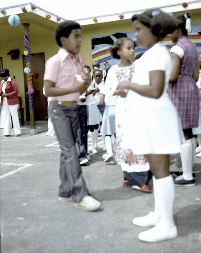 Unidentified children participate in school program