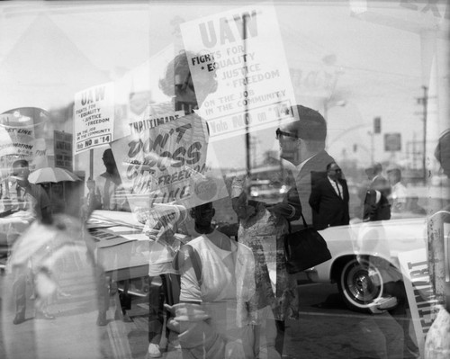 Demonstrators outside the Thriftimart