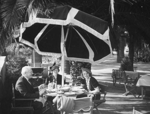 Ethel Schultheis and parents enjoy lunch at the Palms Grill