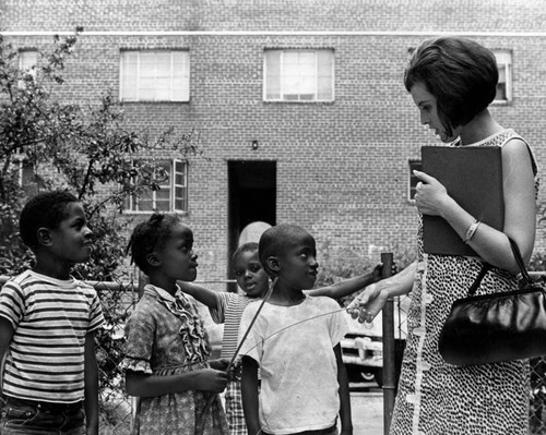 Patricia Beccia works in the field, housing project